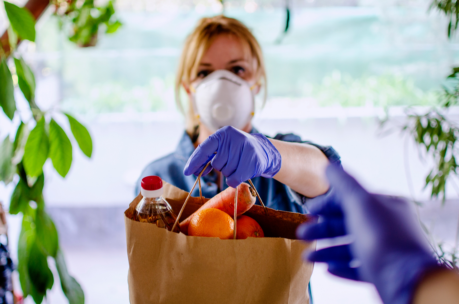 JReady | A Volunteers Handing Food Basket